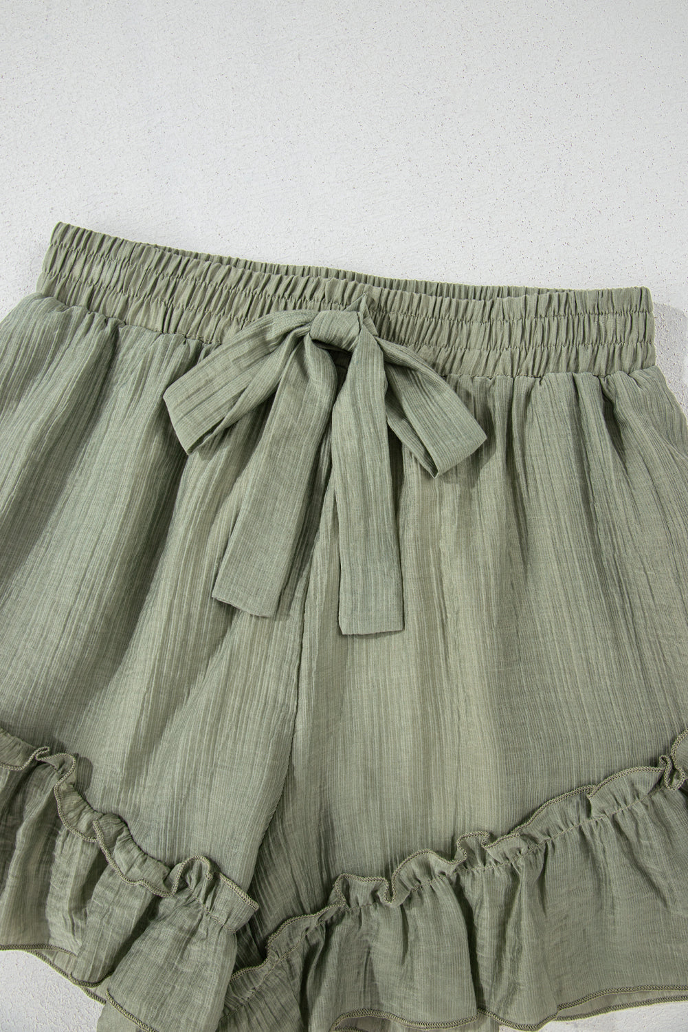 Laurel Green Textured Tie Waist Ruffle Hem Shorts-Chaelisa's New Jammies
